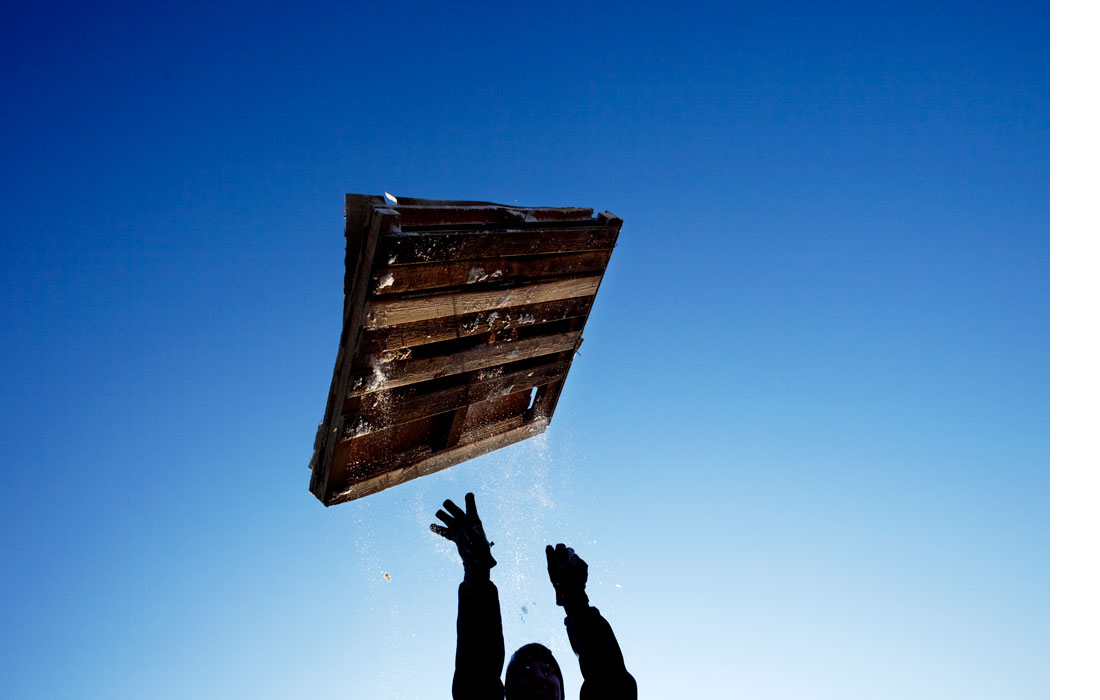 A pallet is thrown into the air