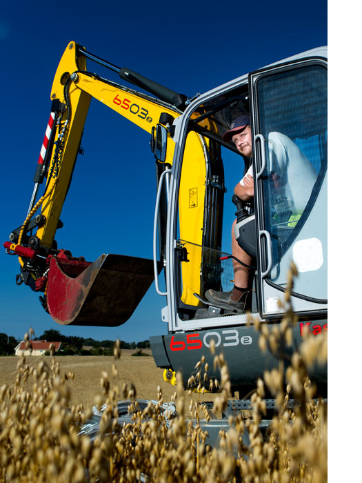 A man is sitting in a excavator