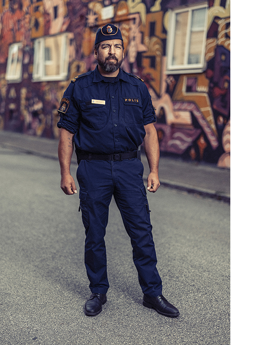 A portrait of a male police officer