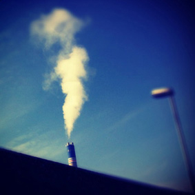 Smoke is coming out of a factory